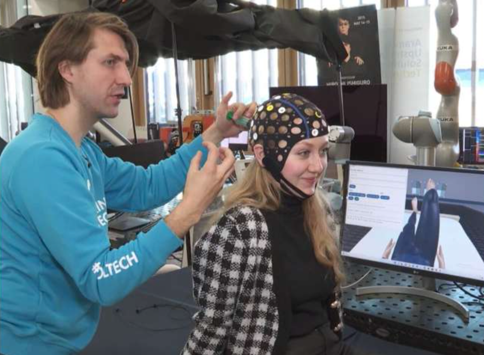 Figure 1: Patients wear a non-invasive electrode cap that can detect their brain signals.